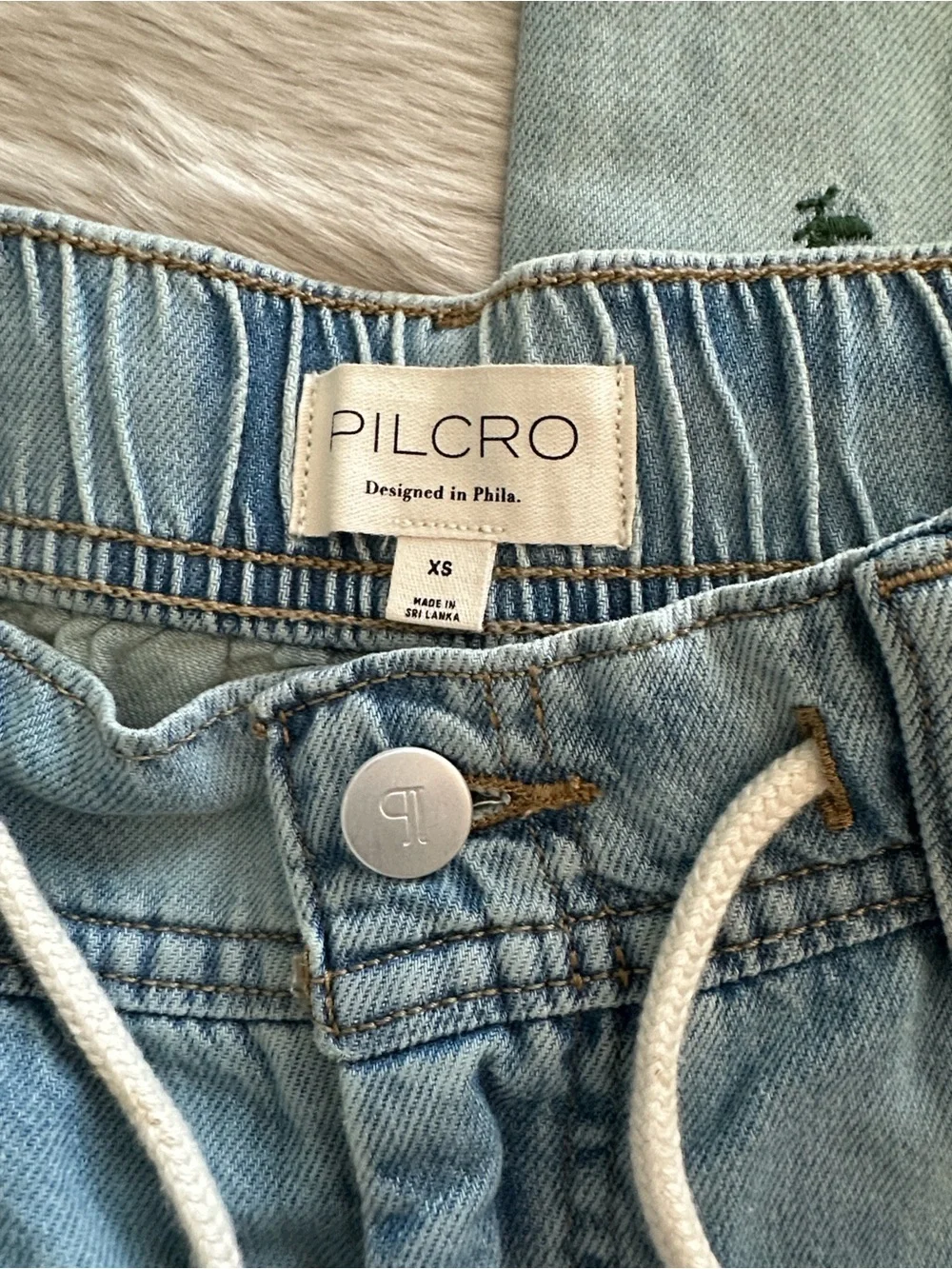 Pilcro by Anthropologie Adi Mid-Rise Flare Ditsy Jeans - Picture 10 of 11